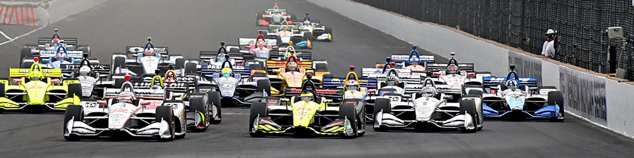 indy cars racing to through the start line Jacksonville